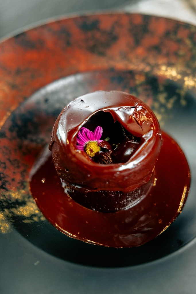 Chocolate bomb with cinnamon ice cream