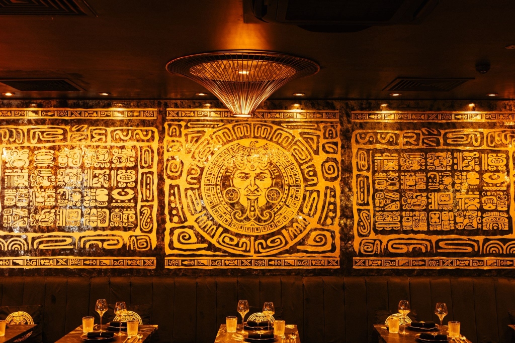 Mayan glyph calendar engravings on wall