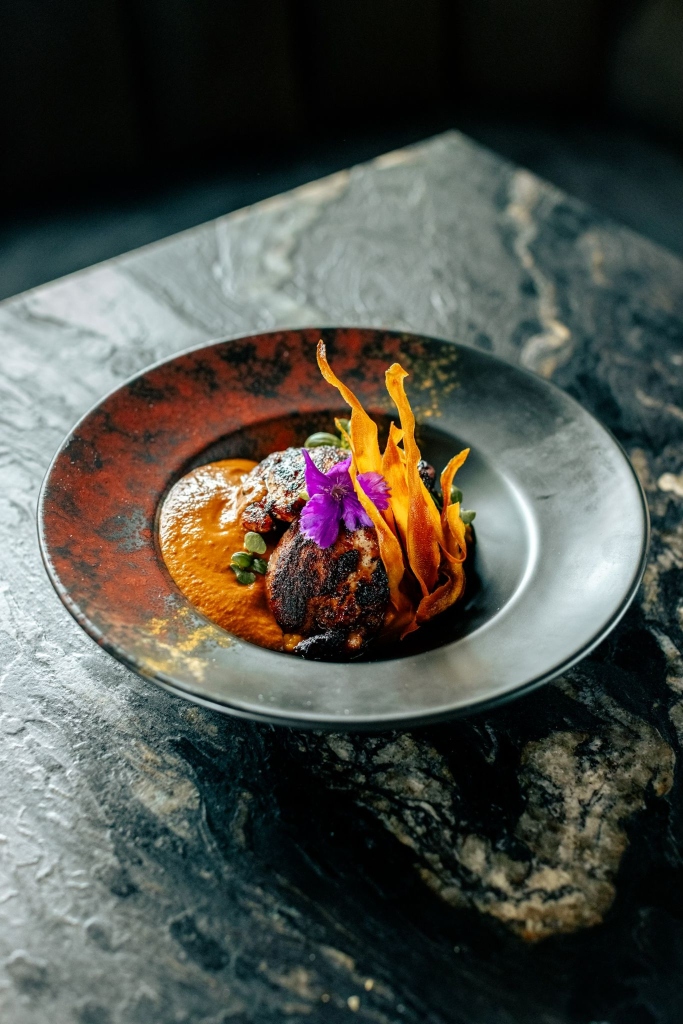 Chicken mole with sweet potatoes and 70% chocolate sauce